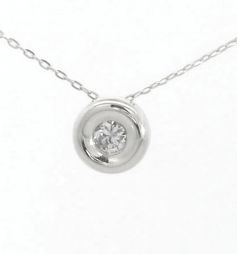 COLGANTE CHATON ORO BLANCO ESTAMPACION 5MM.BRILLANTE H-SI 1.0.07CT