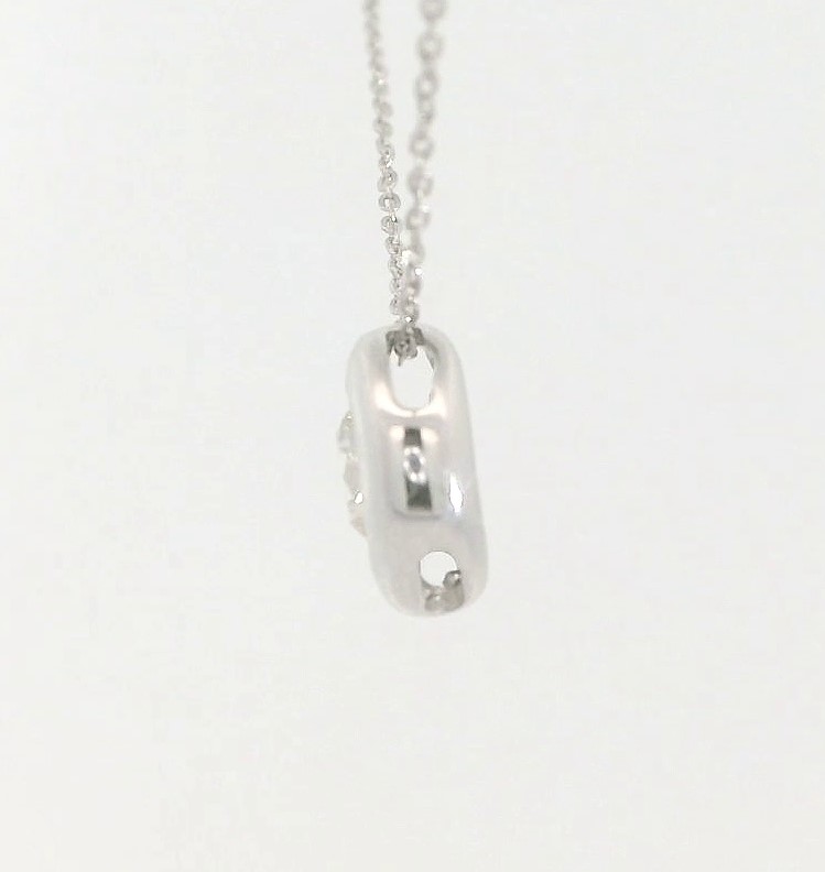 COLGANTE CHATON FUNDICION ORO BLANCO 6MM.BRILLANTE H-SI 1 . 0.17CT