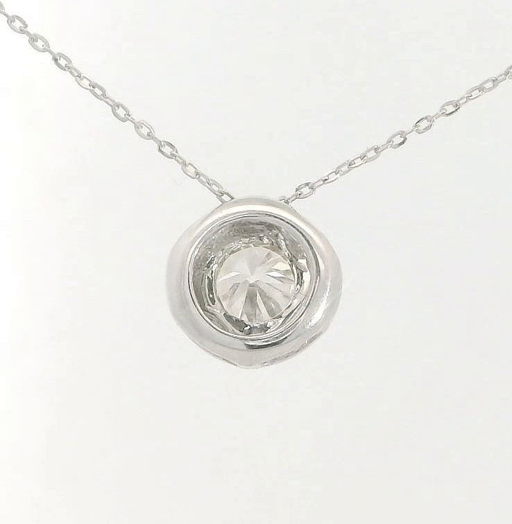 COLGANTE CHATON FUNDICION ORO BLANCO 5MM. BRILLANTE H-SI 1 . 0.10 CT.