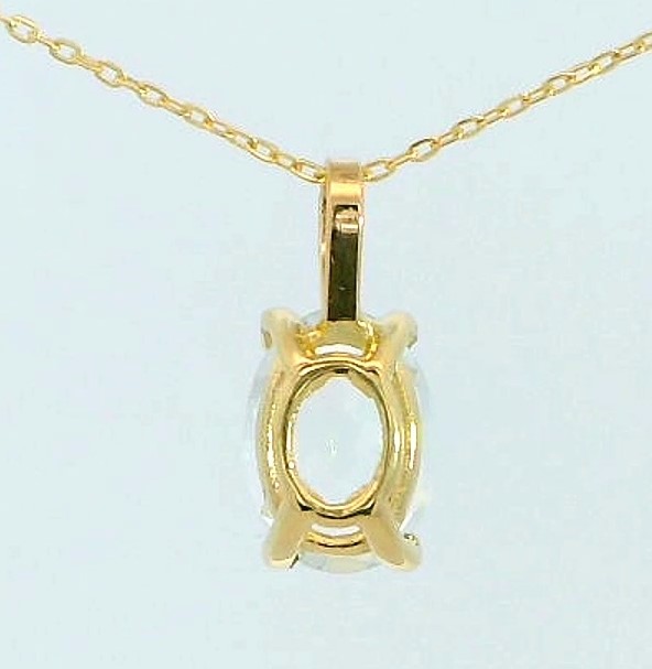 COLGANTE TOPACIO BLANCO OVAL 7x5MM. 9 KILATES