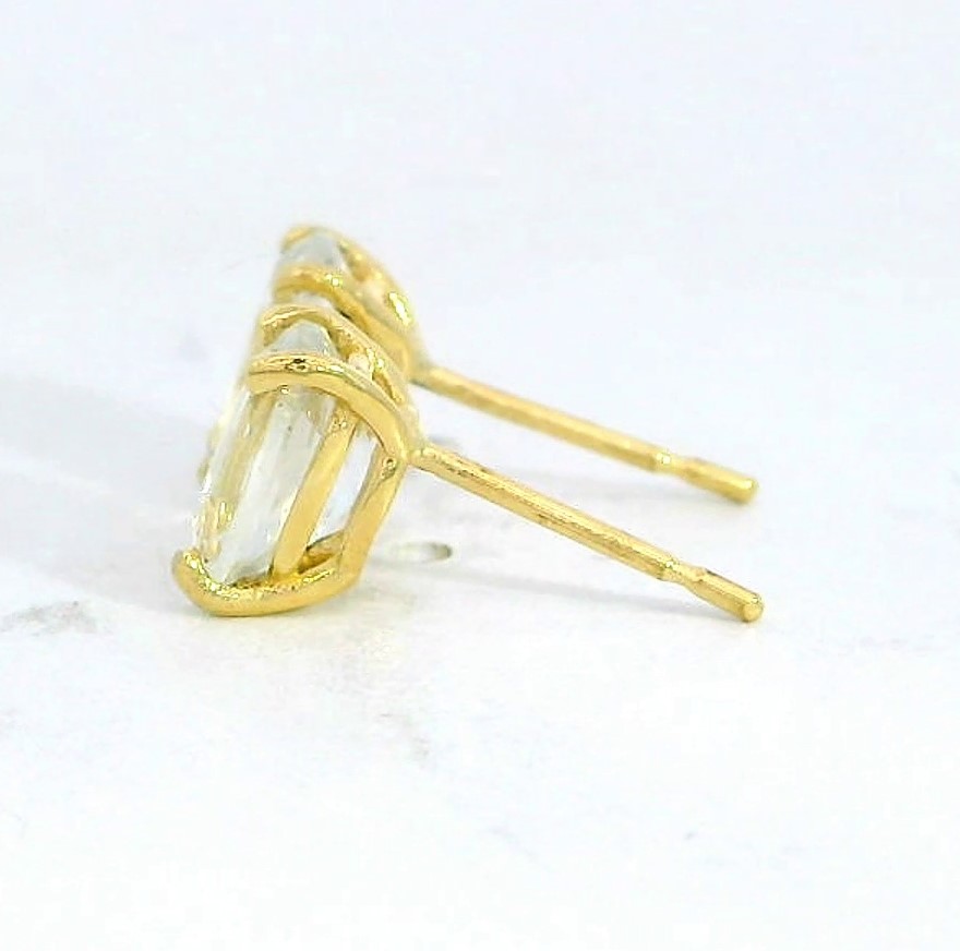 PENDIENTES TOPACIO BLANCO OVAL 7x5MM.PRESION 9KILATES