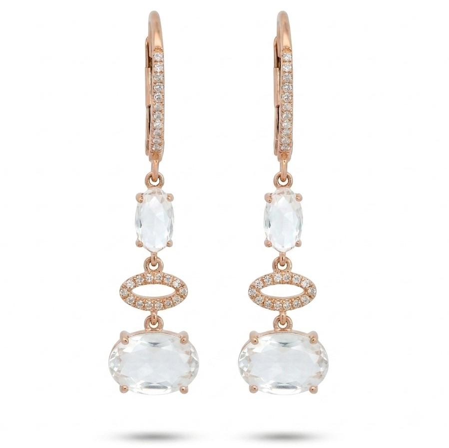 DIAMOND AND TOPAZ LEVERBACK EARRINGS.DIAMONDS H-SI 0.12 CT TW.