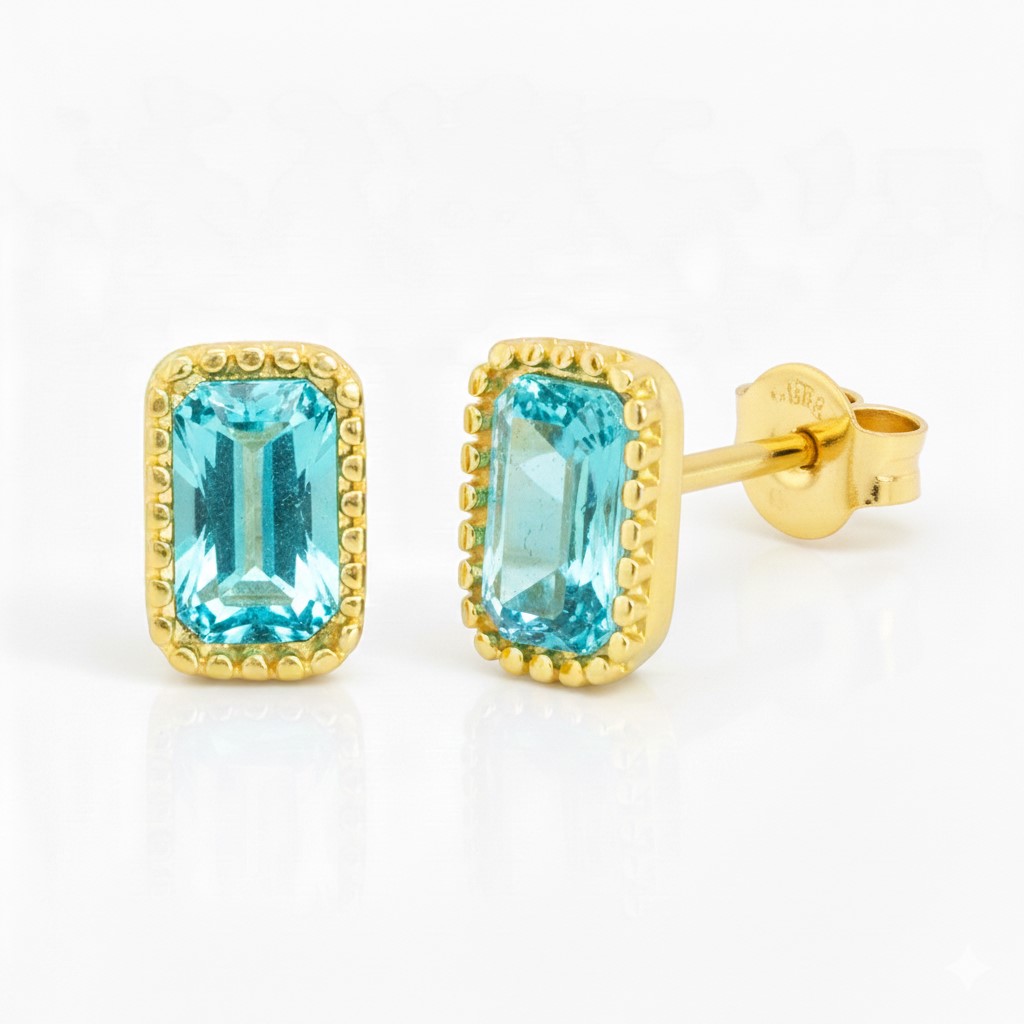 PENDIENTES CIRCONITA OCTOGONO COLOR AGUAMARINA DE 6x4MM.9 KILATES