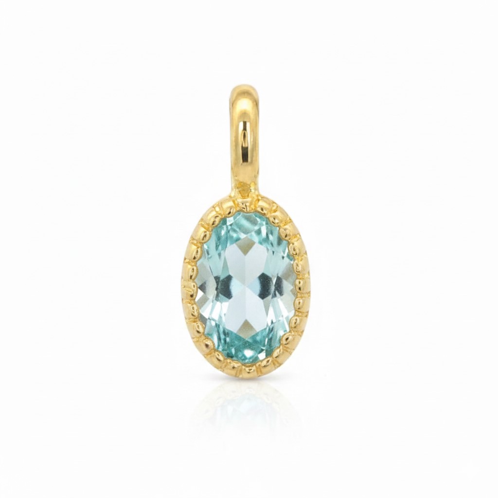 COLGANTE OVAL 6X4MM COLOR AGUAMARINA.9 KILATES